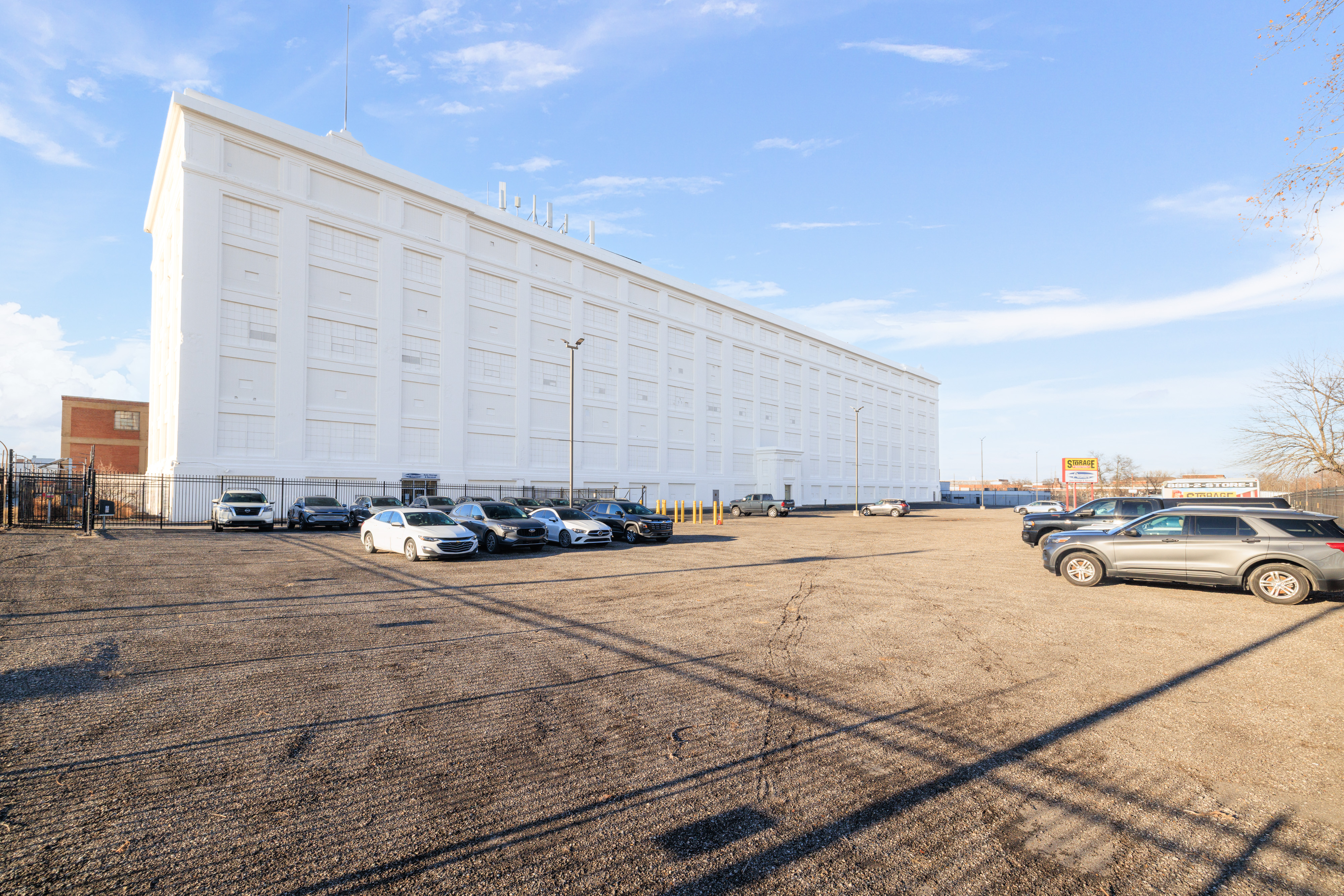 Outdoor parking lot beside our facility building